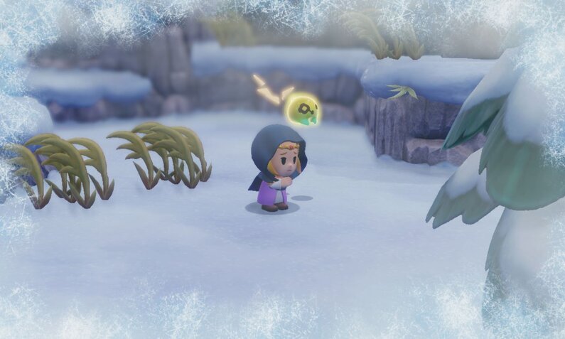 Ein kleiner Charakter in einer lilafarbenen Robe steht frierend im Schnee, während Frost den Rand des Bildes säumt. | © Nintendo