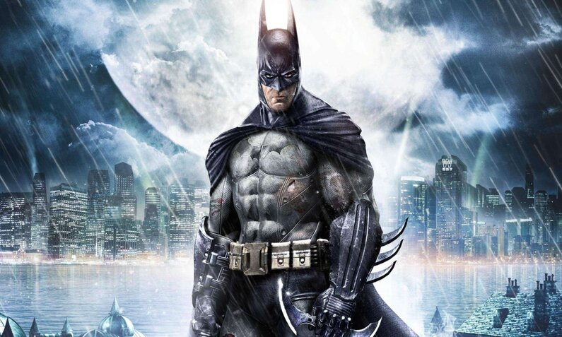 Batman steht vor der Skyline von Gotham City und blickt ernst in die Kamera. | © Warner Bros