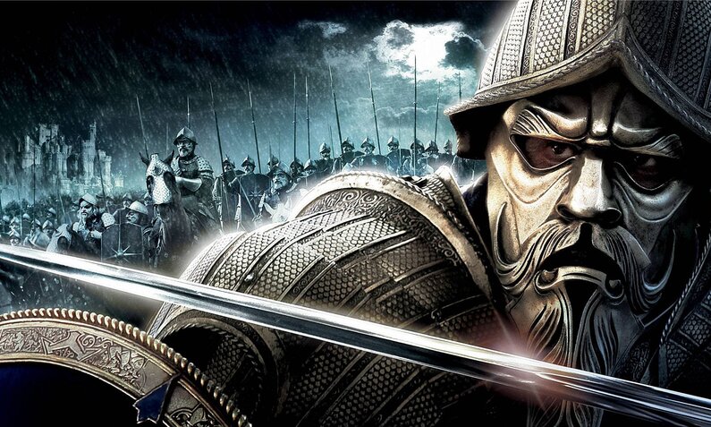 Nahaufnahme von einem altertümlichen Krieger in voller Rüstung mit Maske, hinter ihm ein ganzes Heer auf der Keyart zum Kinofilm "Die Chroniken von Narnia: Prinz Kaspian" | © Imago/ZUMA Wire